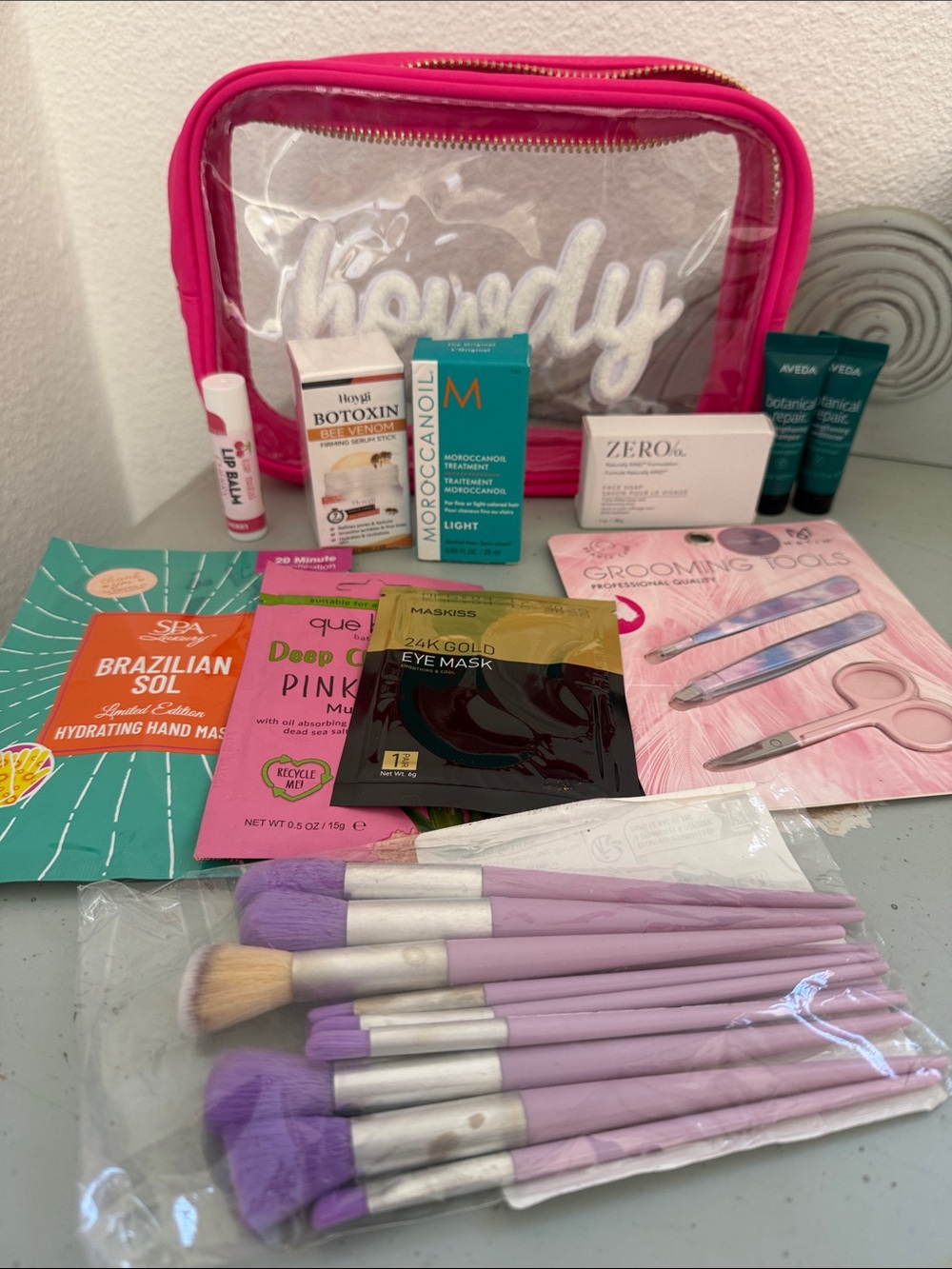 Clear Hot Pink Cosmetic Pouch with Lavender Makeup Brushes & Beauty items